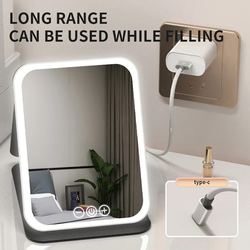 Blushimmer LED makeup mirror with touch screen, foldable design, 3 color options, rechargeable, ideal for travel and home use
