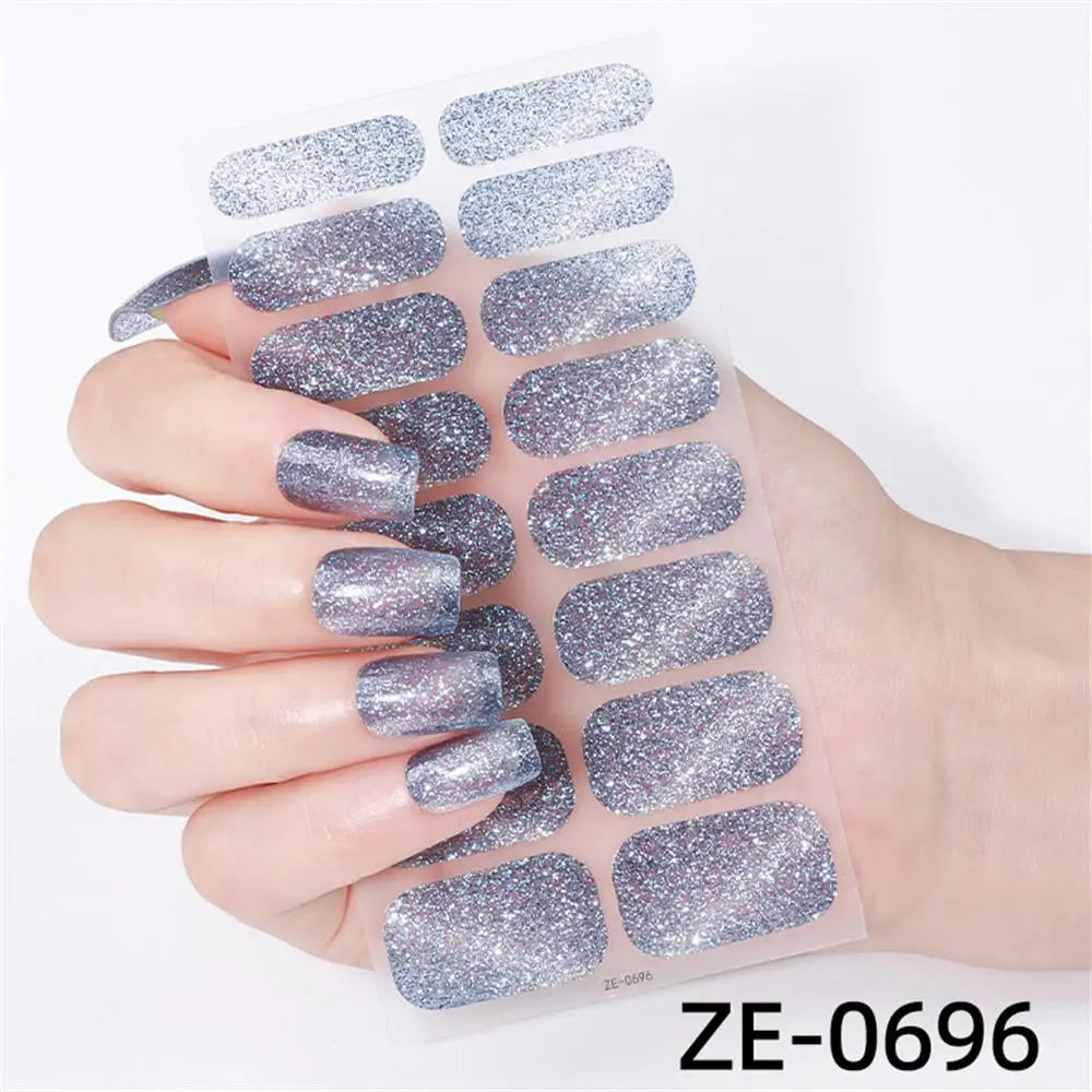 Set of 16 Blushimmer gradient cat eye style nail art stickers with waterproof glitter design on self-adhesive false nail decals.