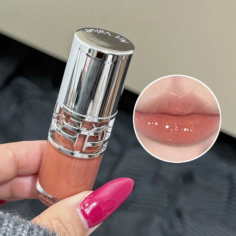 Blushimmer transparent moisturizing lip gloss with crystal shine, hydrating lips and adding a tinted plumper effect.