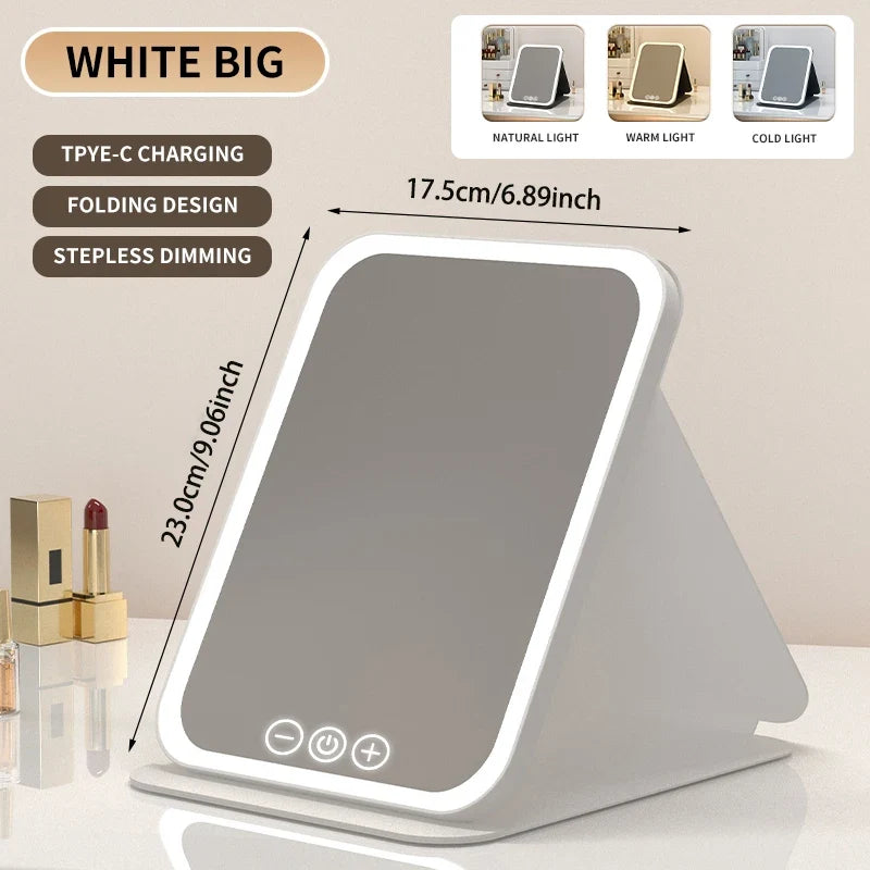 Blushimmer dimmable LED makeup mirror with touch screen, foldable design, rechargeable, suitable for travel and home use.