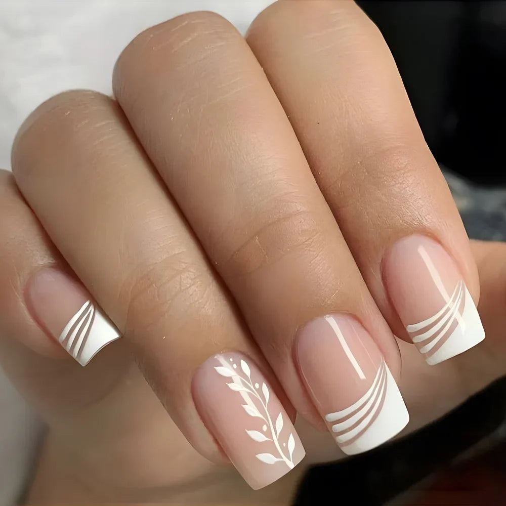 Set of 24 Blushimmer square head fake nails with pink and white gradient French press design on short full cover false nail tips.