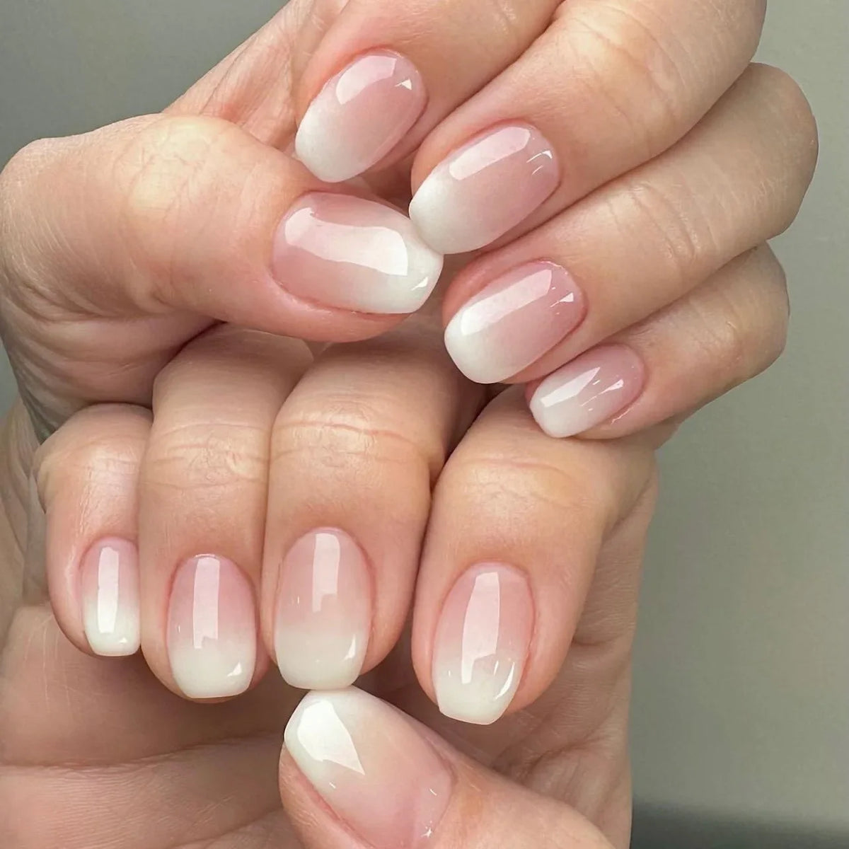 Set of 24 pink and white gradient square fake nail tips with French press design by Blushimmer, short full cover false nails.