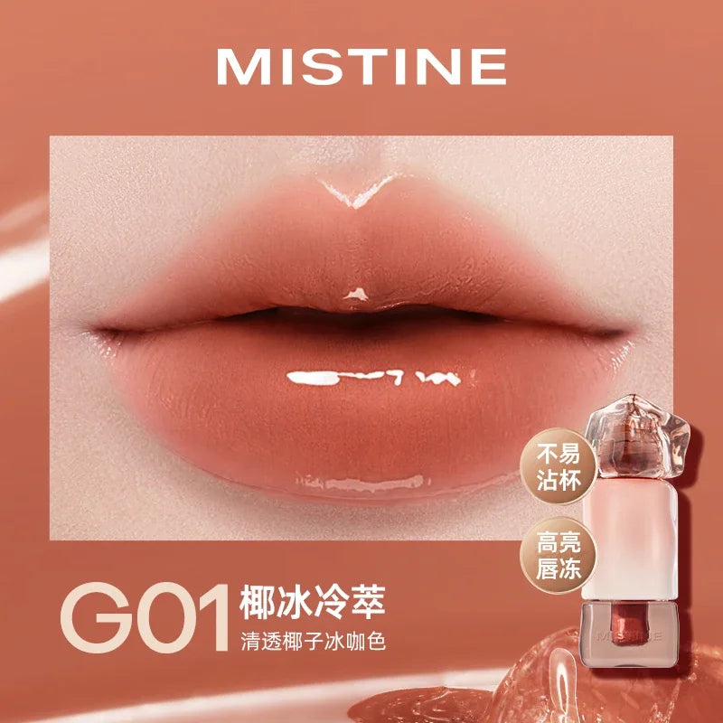 Blushimmer Mistine Nude Long Wear Lipstick in creamy matte finish, showing a sleek 2.9g tube with glossy lip glaze in a mirror.