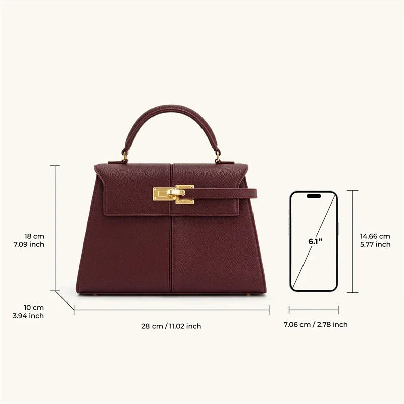 Wine red women's OBA crossbody handbag with a sleek satchel design, featuring a top handle and adjustable strap.