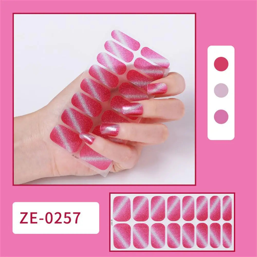 Gradient cat eye style nail art stickers by Blushimmer, 16-piece waterproof glitter false nail decals on a sheet.