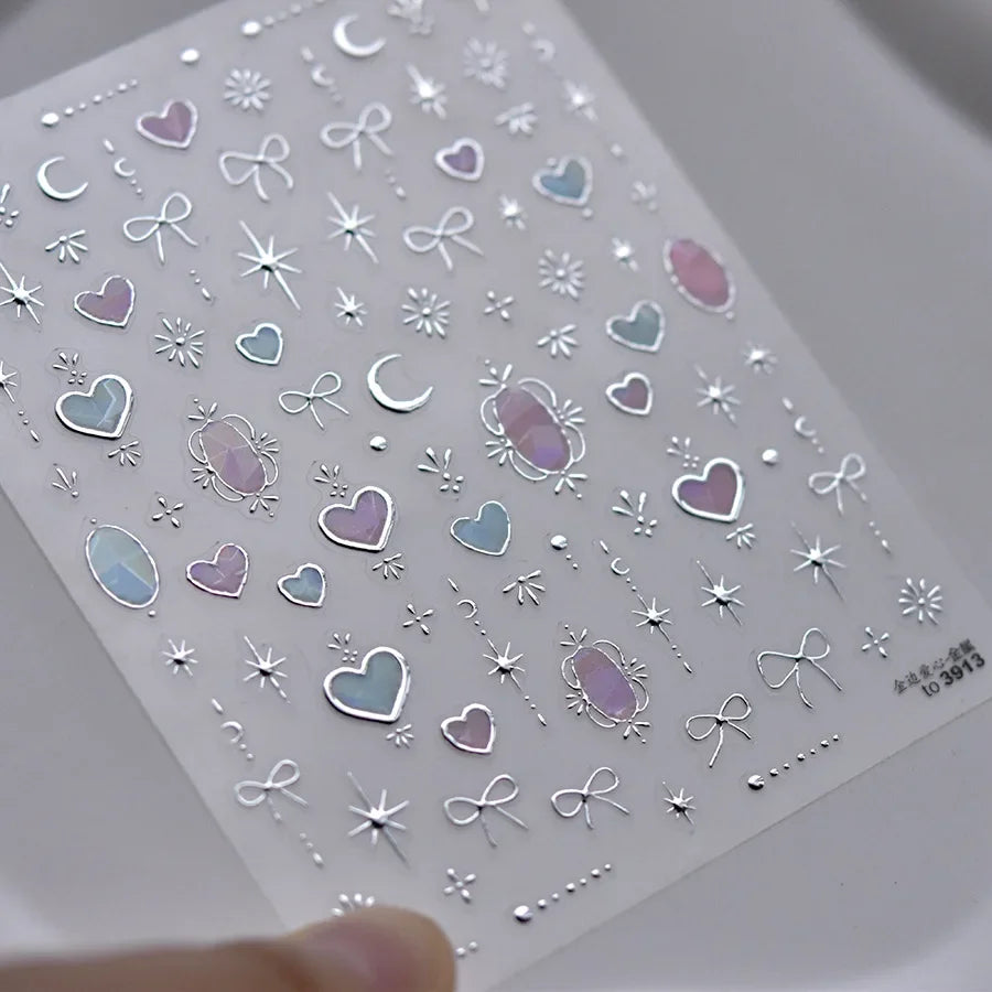 Colorful Cat's Eye 5D gradient European love heart gem nail art stickers with wing and geometric designs for manicures.