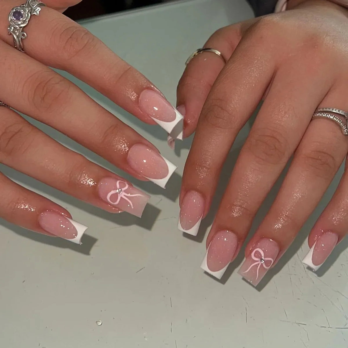 Set of 24 Pink and White Gradient French false nail tips with square head design by Blushimmer, includes jelly glue, short full cover nails.