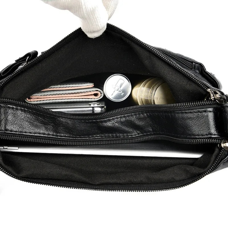 NNEOBA women's black multi-layer leather shoulder crossbody bag with multiple compartments and adjustable strap.