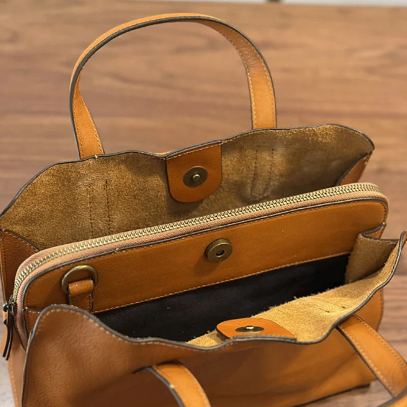 Women's genuine leather crossbody tote bag by NNEOBA, stylish and spacious leather backpack with adjustable strap.