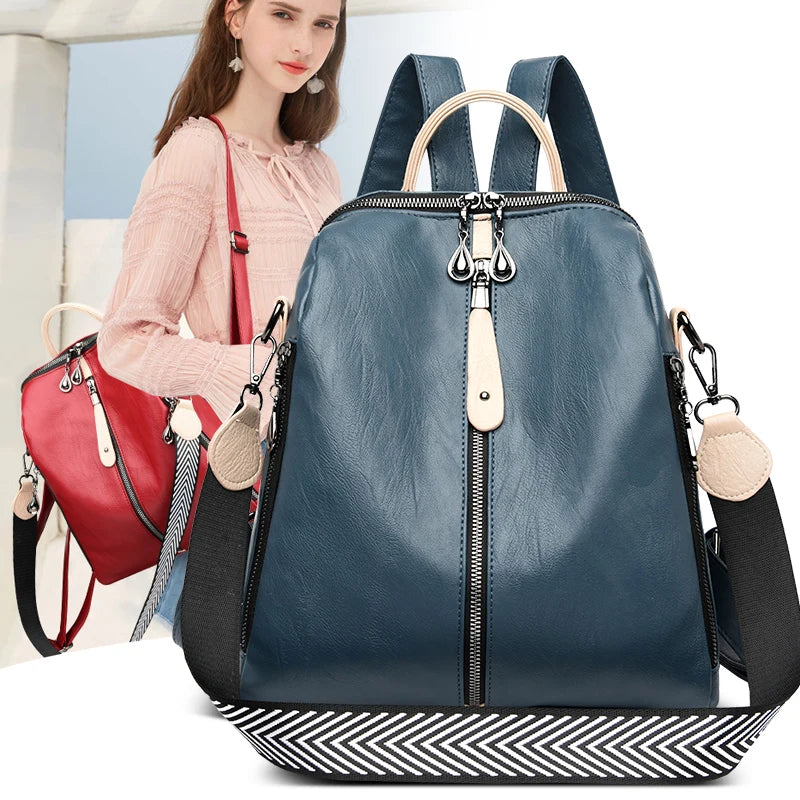 Women’s blue PU leather fashion backpack by OBA, featuring a stylish, soft leather design with adjustable straps and front pocket.