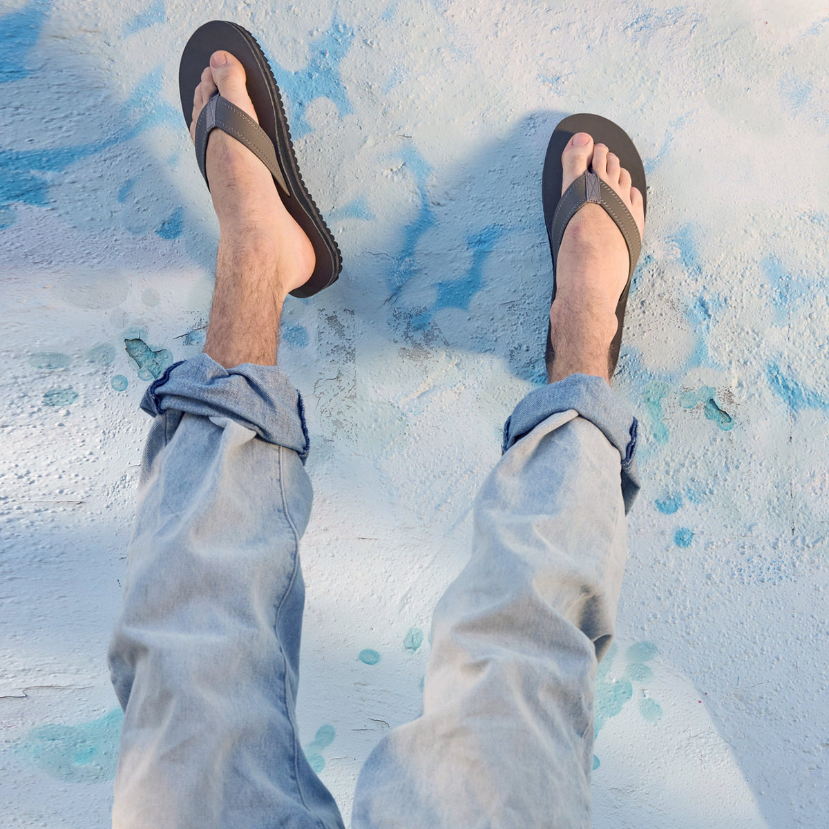 Seagrove Flip Flop by Fleks in Nightfall color, featuring casual style and comfortable design, worn casually outdoors.
