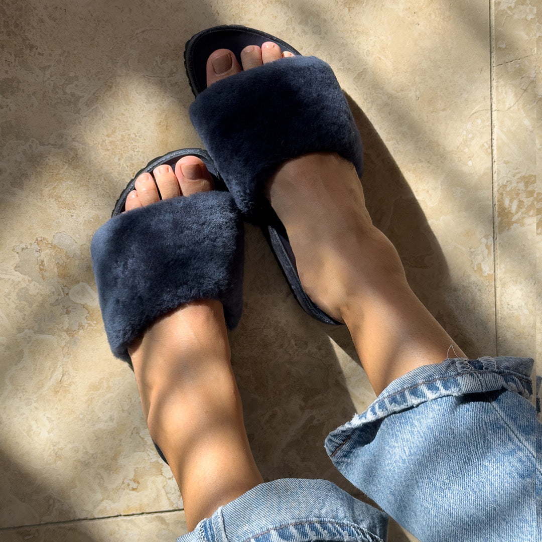 Fleks San Ysidro Slide in deep blue sea color, featuring a comfortable slip-on design with cushioned sole and casual style.