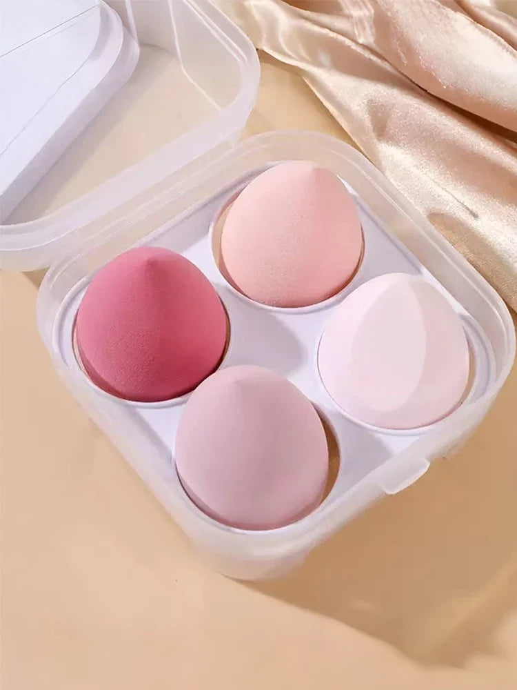Blushimmer 4-piece makeup sponge set with blending puffs for foundation, powder, and liquid makeup, travel-friendly storage included.