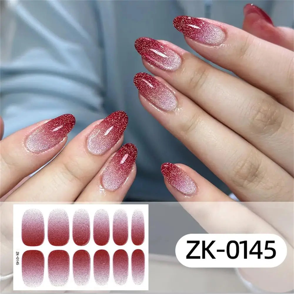 Gradient cat eye style nail art stickers by Blushimmer, 16-piece set with waterproof glitter false nail decals on a clear background.
