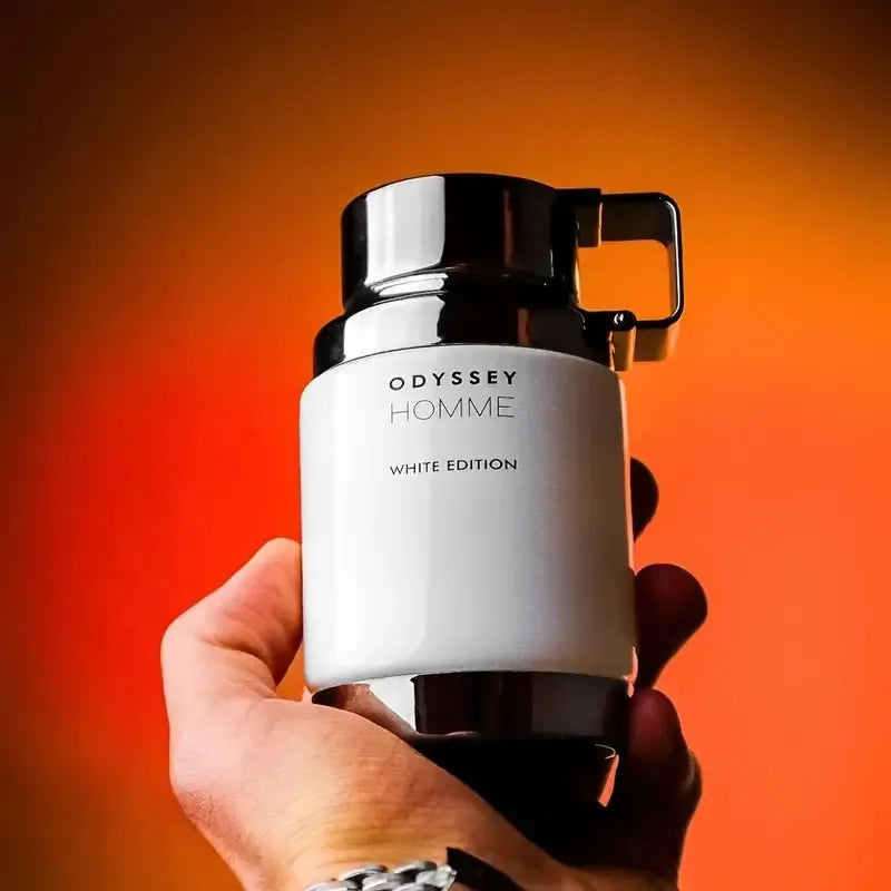 Armaf Odyssey Homme White Edition men's Eau De Toilette spray in 3.4 oz bottle, featuring sleek white packaging and elegant design.