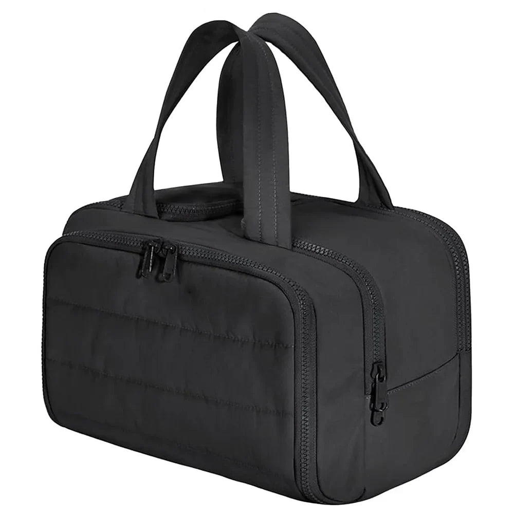 Large capacity waterproof cosmetic bag by Blushimmer with multiple compartments for travel toiletries and makeup organizer.