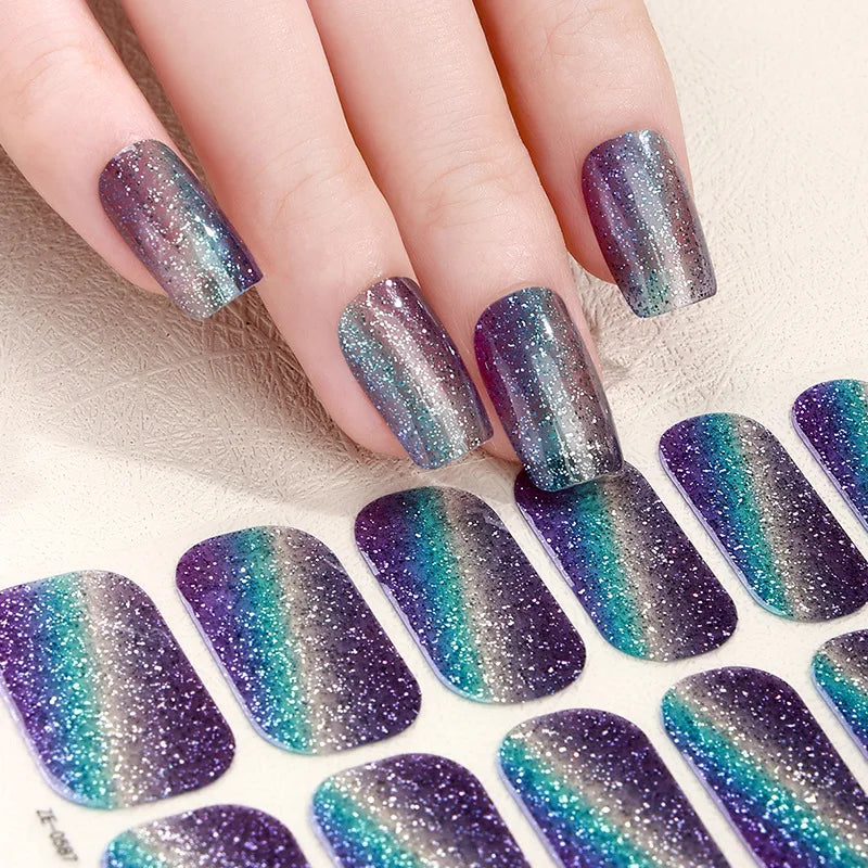 Gradient cat eye style nail art stickers by Blushimmer, 16-piece waterproof glitter false nail decals with self-adhesive design.