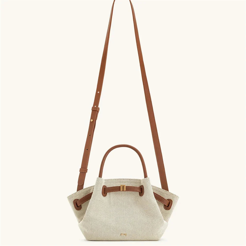 OBA women's brown canvas mini crossbody shoulder bag with adjustable strap and compact design, ideal for casual outings.