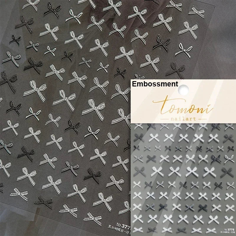 White and black French leopard print bowknot lace ribbon with rhinestones and pearls, perfect for nail art manicure decorations.
