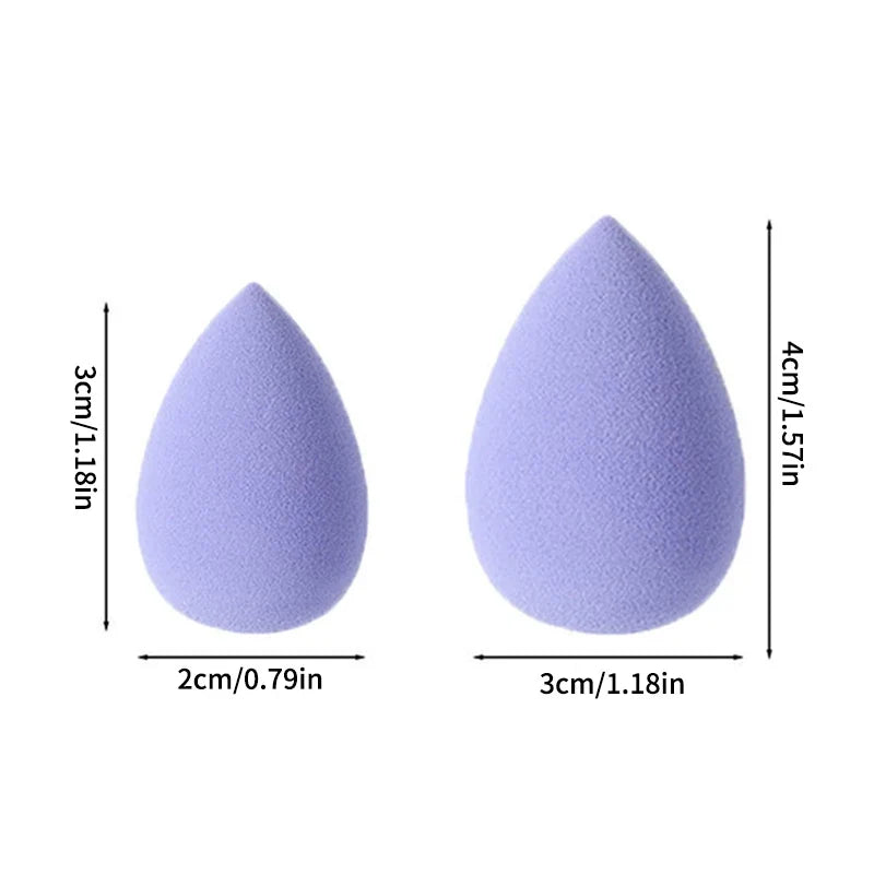 Set of 12 Blushimmer powder puffs featuring soft velour triangles for applying loose and setting powder smoothly.