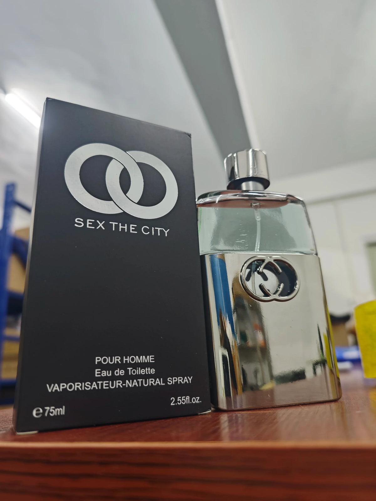 Blushimmer Guilty Black pheromone perfume cologne with fresh woody sandalwood scent for men and women, light fragrance bottle.