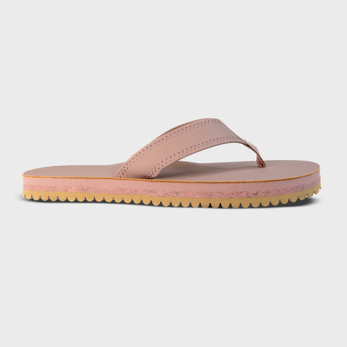 Fleks Seagrove Flip Flop in Blushed color, featuring a comfortable rubber sole and stylish strap design, shown in side profile image.