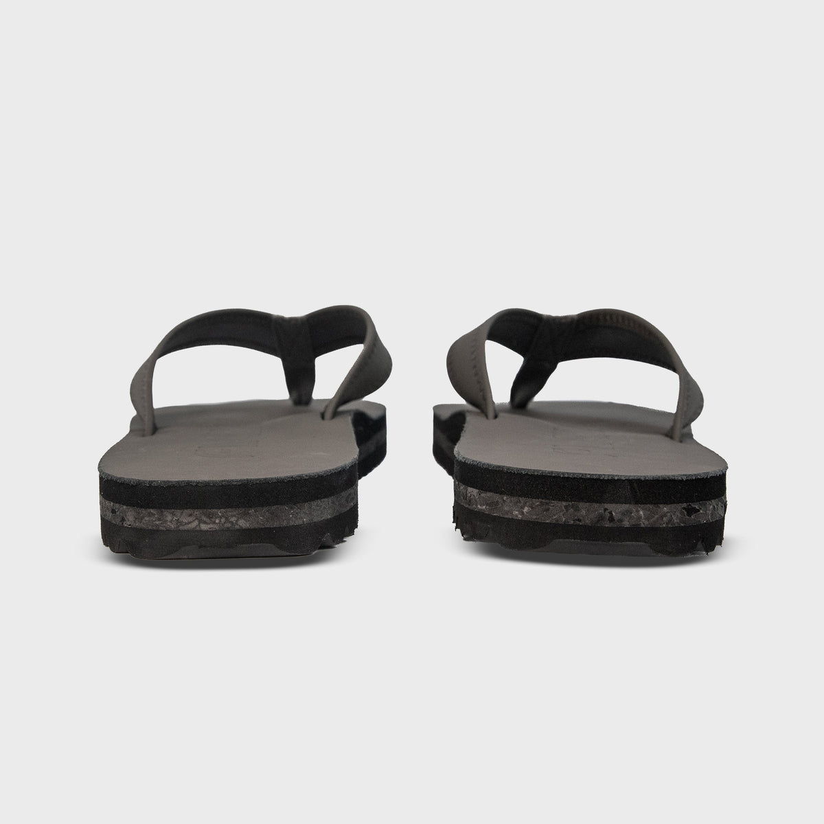 Rear view of Fleks Seagrove Flip Flops in Nightfall color, showing comfortable straps and casual style.