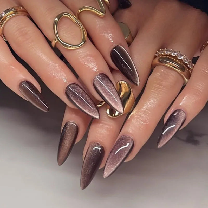 Glossy red cat's eye press-on nails by Blushimmer, full cover almond-shaped false nails with nude color and detachable charms.