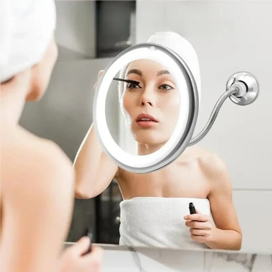 Blushimmer 10X magnifying LED makeup mirror with gooseneck, suction cup mount, diffused light, and 360° swivel on bathroom vanity