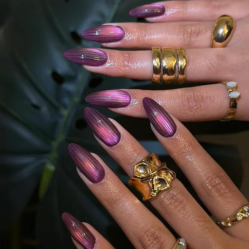 Set of 24 glossy red Cat's Eye press on nails with nude color, almond shape, from Blushimmer, including charms and detachable false nails.