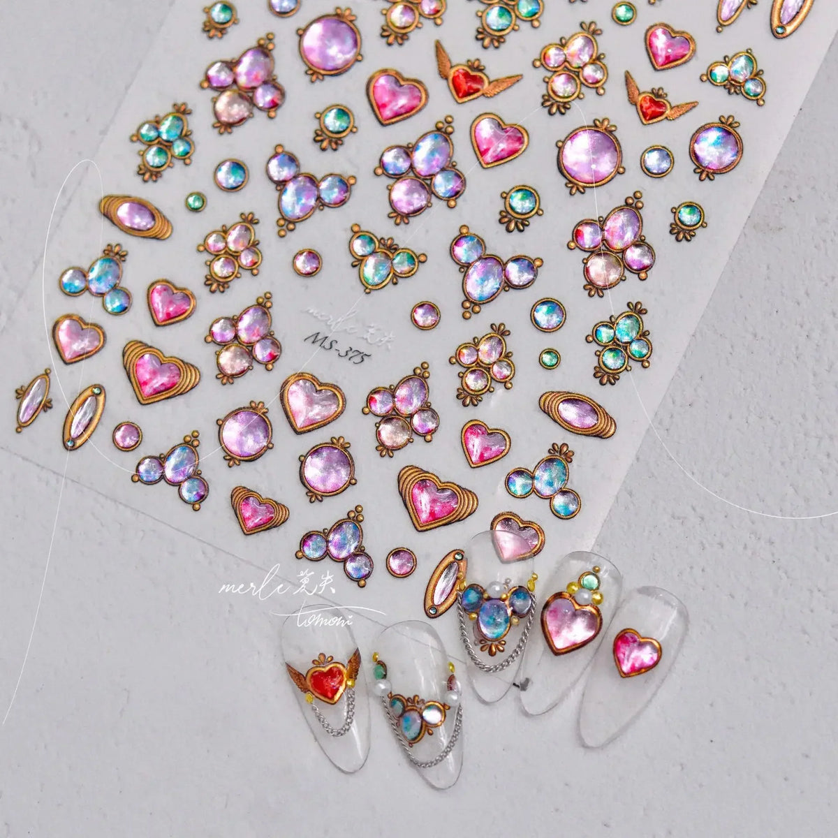 Colorful Cat's Eye 5D gradient European love heart gem nail art stickers with wing accents, perfect for manicure decoration.