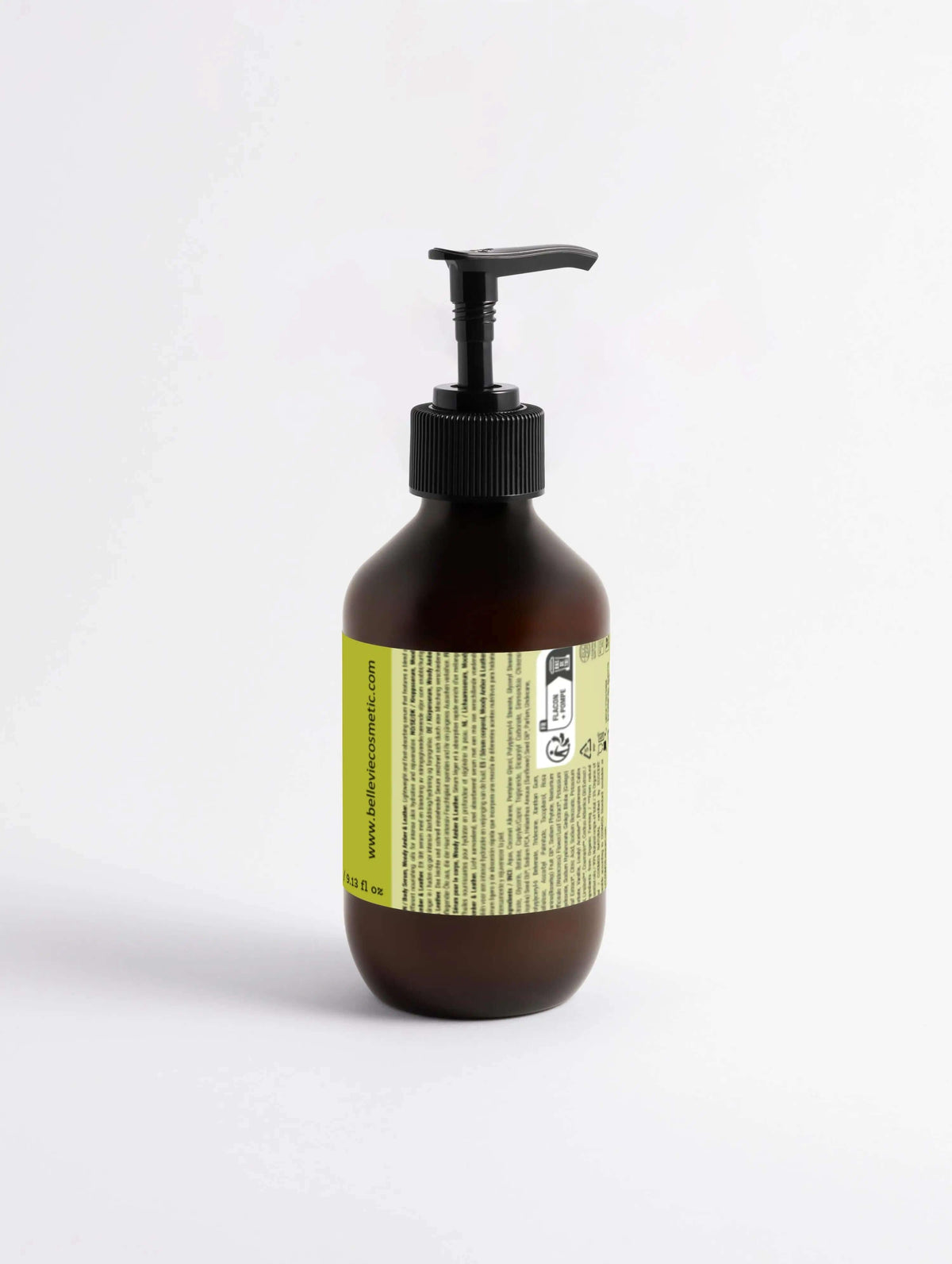Silk Skin Body Serum in a 270ml bottle with woody amber and leather scent, featuring a sleek pump dispenser and elegant packaging.