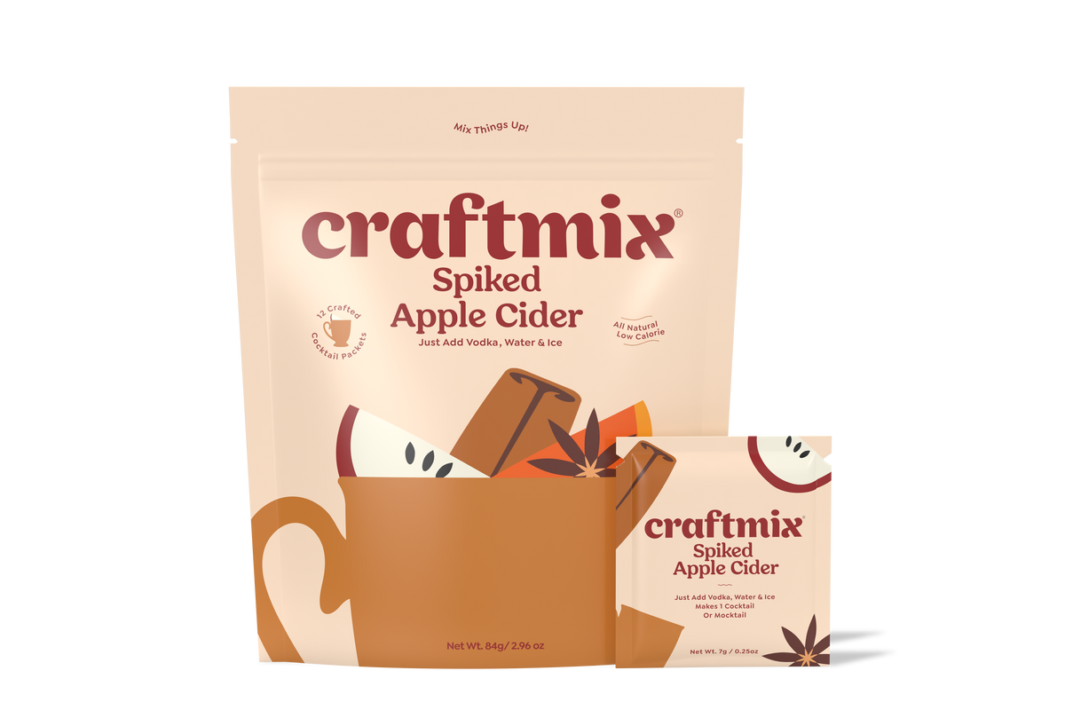 Six-pack of Craftmix Spiked Apple Cider cocktail mix with spiced apple flavor in colorful packaging.