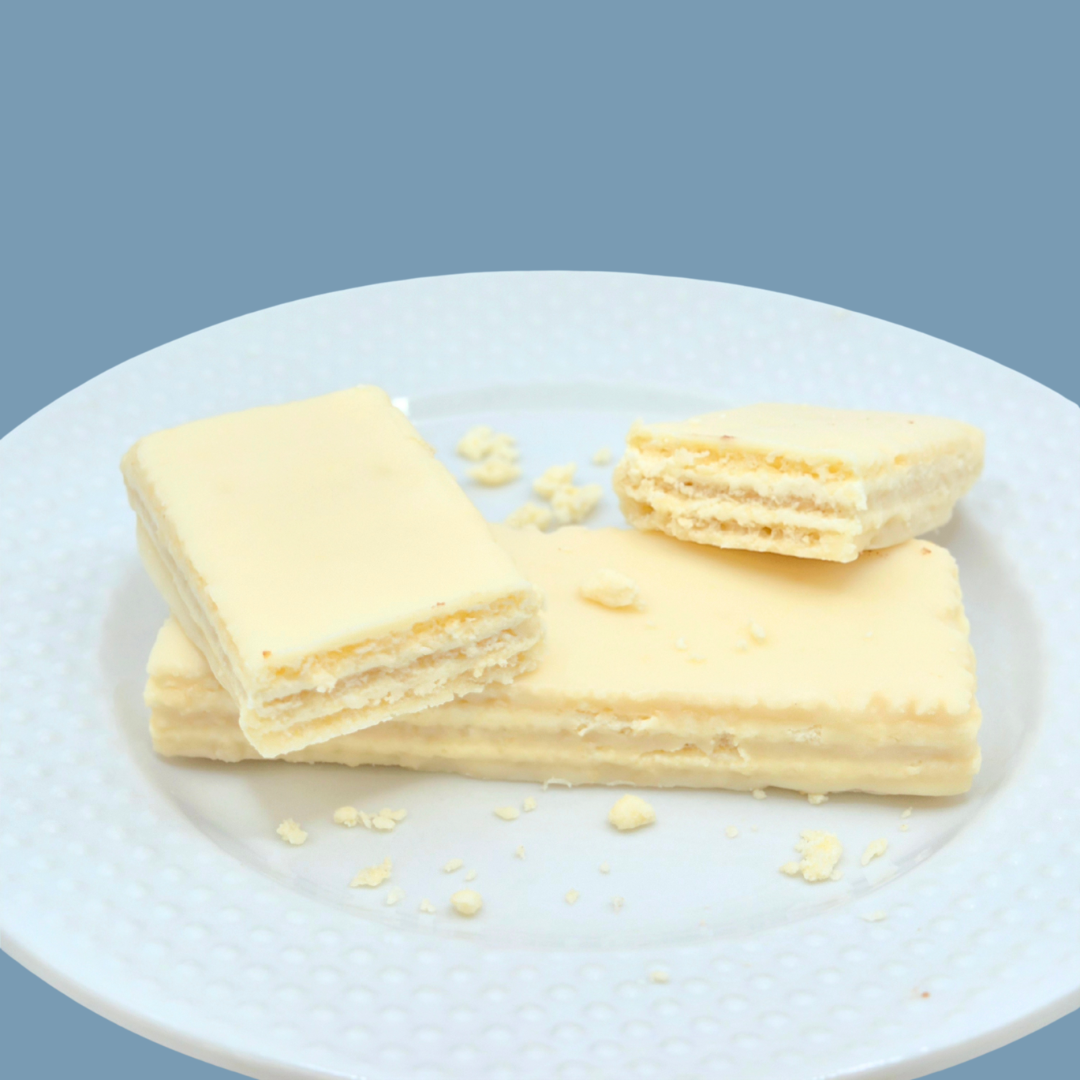 Vanilla PROTIDIET wafer bar by AmBari Nutrition featuring a crispy wafer coated with vanilla-flavored protein.