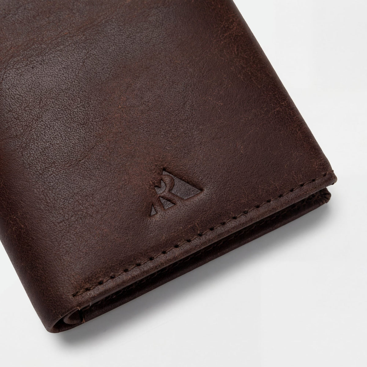 Robust leather wallet with multiple card slots and sleek design, featuring a smooth brown leather finish.