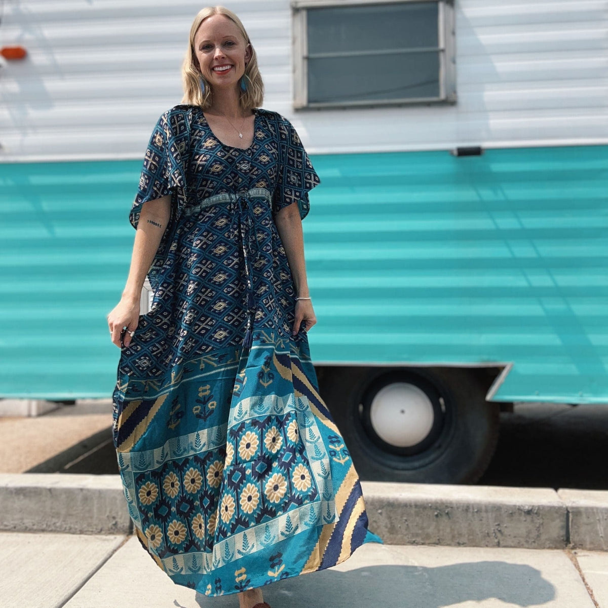 Aanya adjustable long kaftan dress by Darn Good Yarn, eco-friendly crochet knit boho style, plus size women’s clothing.