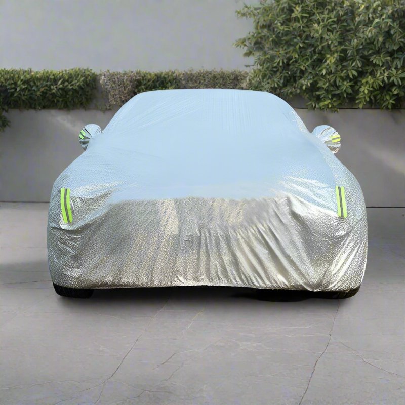 All-weather waterproof Tesla Model 3/Y/S car cover made of Oxford fabric, protecting the vehicle from rain, snow, and dust.