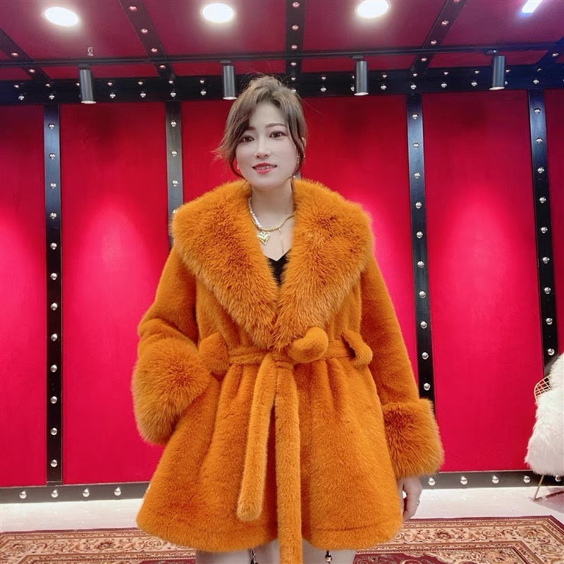 Women's winter fur coat in a warm, elegant design