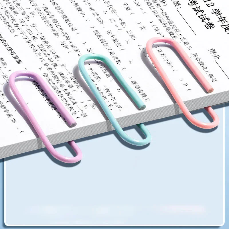 Set of 160 colorful stainless steel paper clips, ideal for organizing files, bookmarks, and stationery in an office setting.