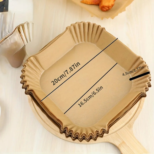 Disposable air fryer paper liners by BackupMyFilesNow.com, waterproof and oil-proof parchment for round, square, and rectangle baking.
