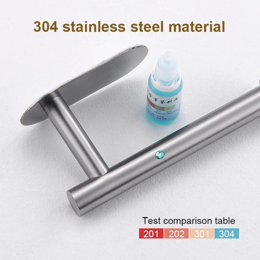 Stainless steel self-adhesive toilet paper and towel holder with wall mount design, suitable for kitchen or bathroom storage.