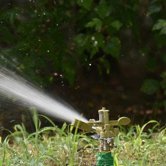 Metal pulsating sprinkler with 360-degree rocker arm, suitable for garden irrigation and lawn watering systems.