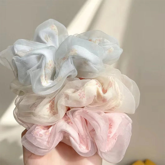 Sweet summer net-like bob hairstyle large intestine hairband for women, stylish early spring hair tie, trendy and versatile accessory.