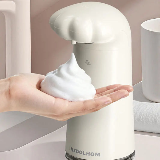 Automatic cat paw soap dispenser with foam sanitizer, sensor, and children’s bubble machine for household hand hygiene.