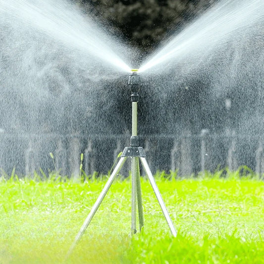 Stainless steel 360 rotary lawn sprinkler on telescopic tripod support, ideal for garden irrigation and watering large lawn areas.