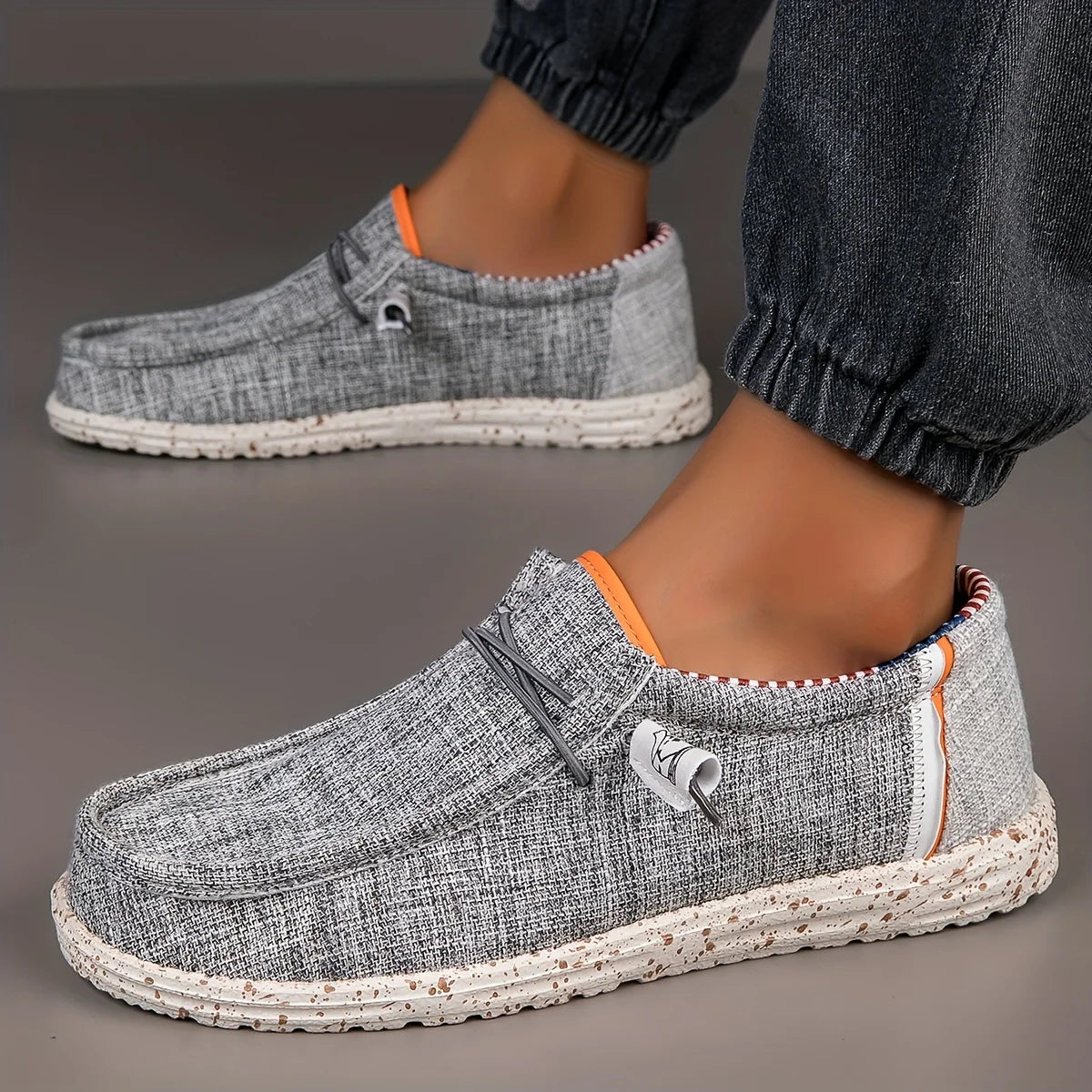 Black men's canvas loafers by BackupMyFilesNow.com, breathable casual shoes with a vulcanized sole, ideal for walking and driving.