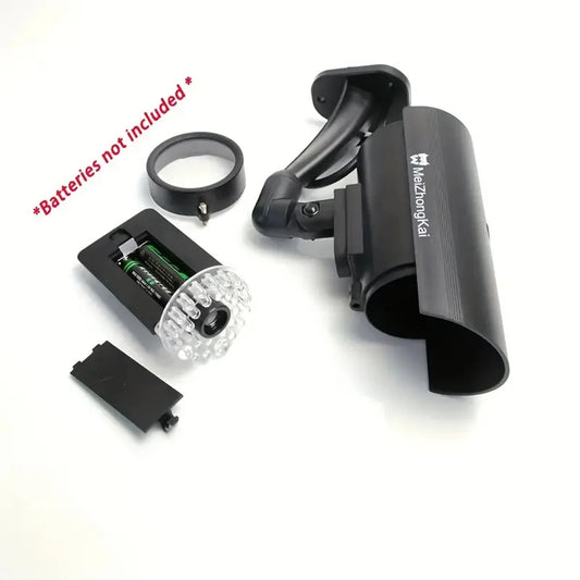 Black dummy security camera with LED red flashing light, battery-powered for indoor and outdoor use, mimics real surveillance equipment.