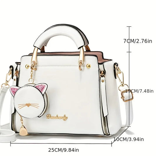 Black women's crossbody handbag with large capacity, stylish fashion purse featuring a cute cat design and multiple compartments.