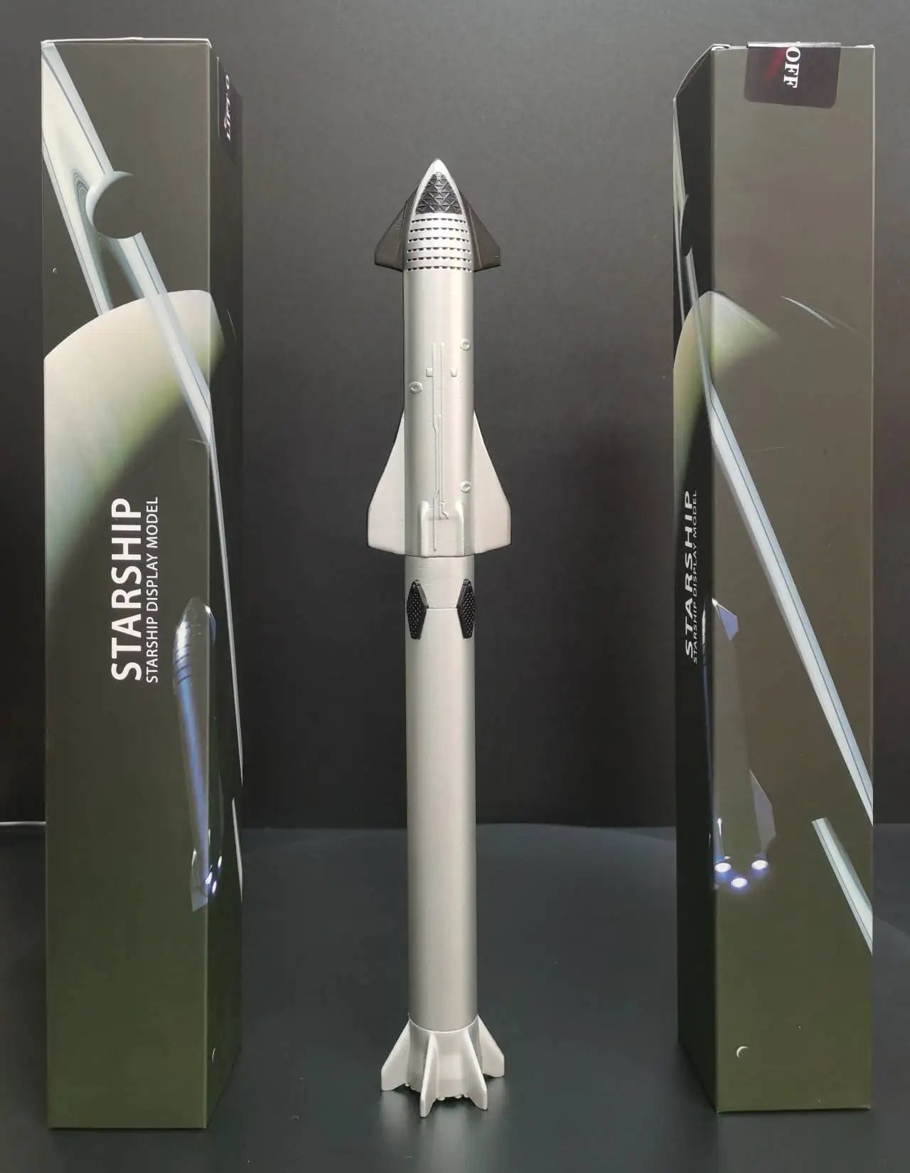 Model of SpaceX Starship Falcon 9 FH Block 5 and Starlink Super Heavy space rocket, detailed miniature replica.