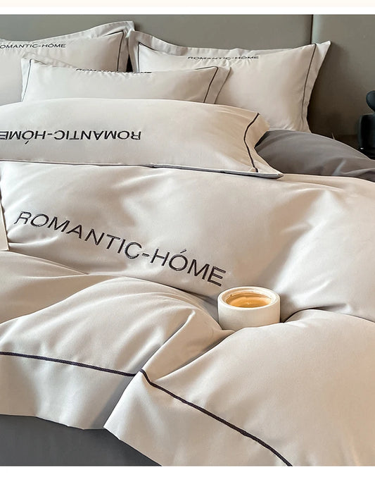 Luxury cotton bedding set with duvet cover, bed sheet, and pillowcases in solid color, available in king, queen, full, and twin sizes.